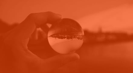 Hand holding crystal sphere_darkOrange